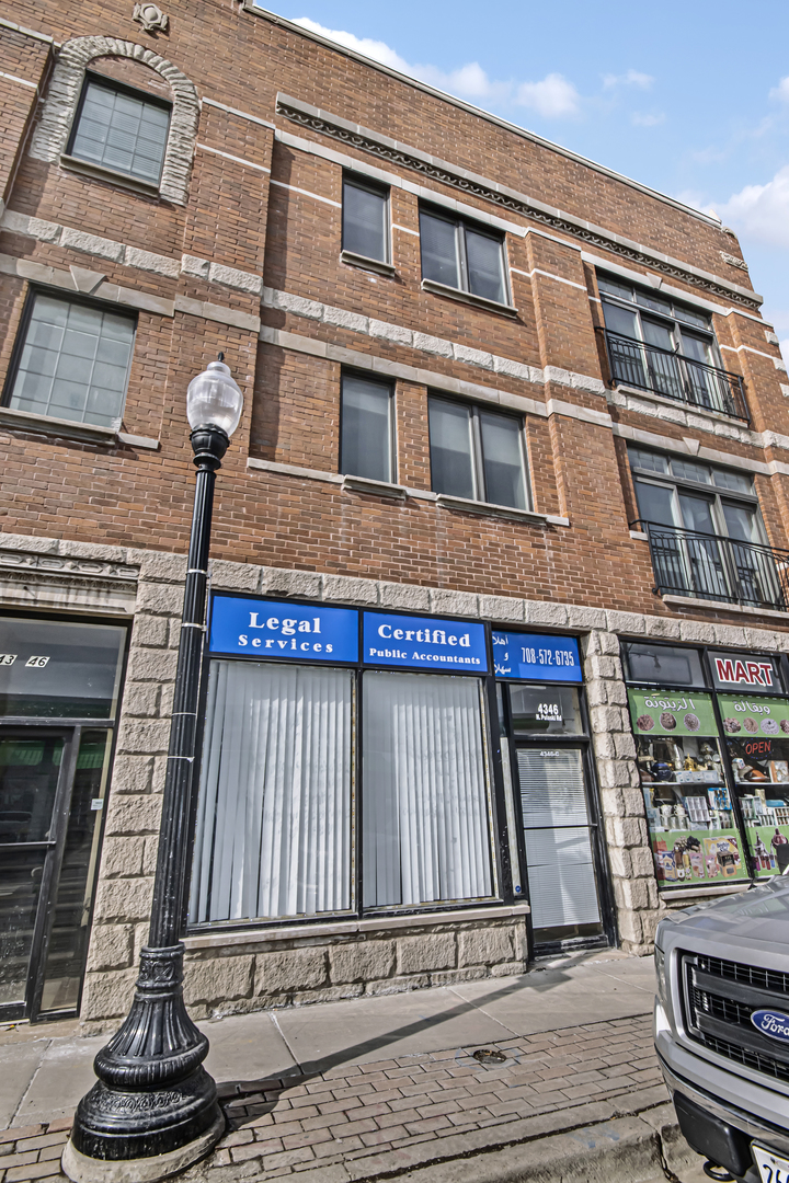4346 North Pulaski Road, Unit C Chicago, IL 60641 - Photo 2 of 21 a front view of a building with glass windows