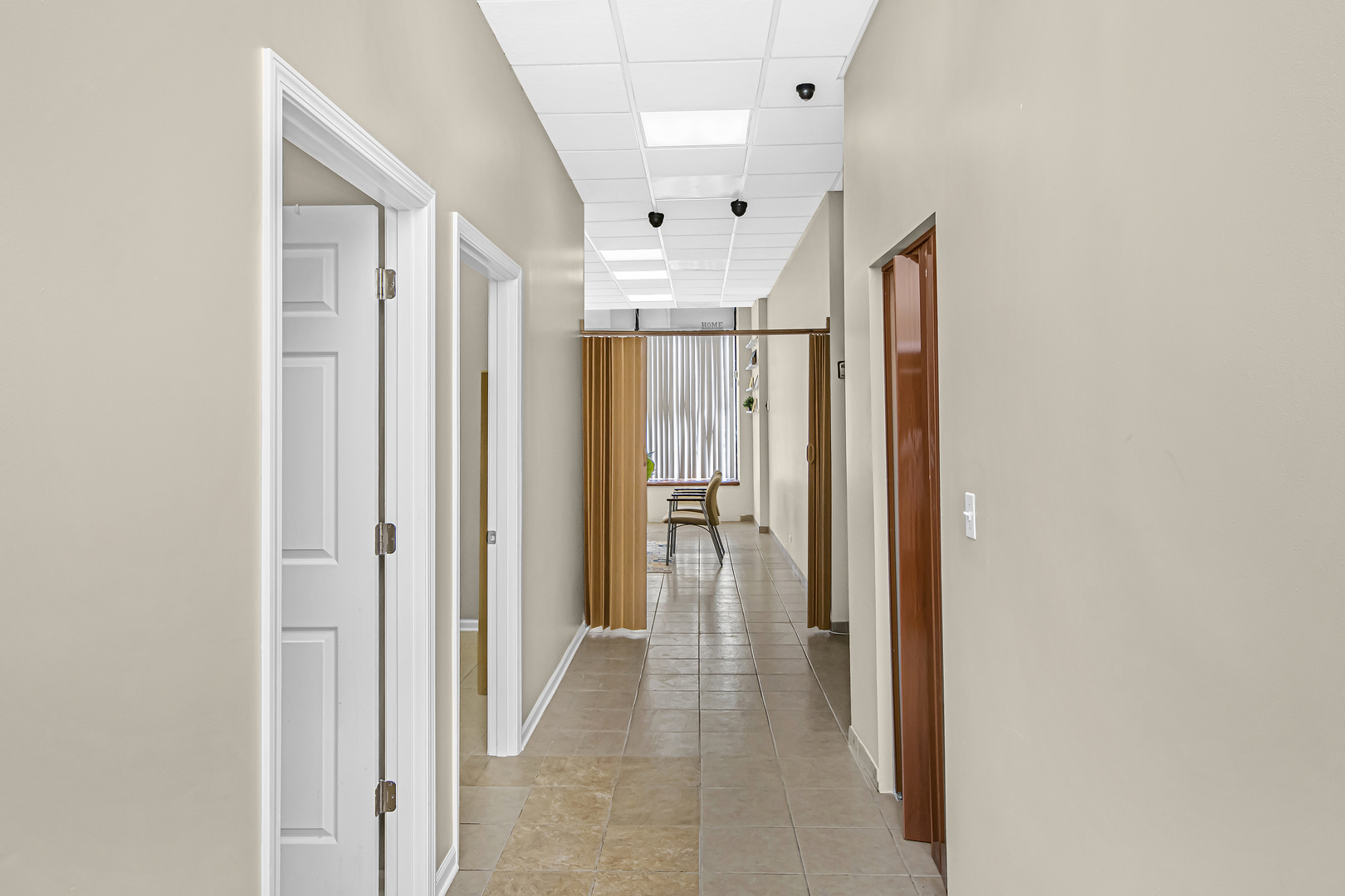 4346 North Pulaski Road, Unit C Chicago, IL 60641 - Photo 4 of 21 a view of a hallway with a chandelier