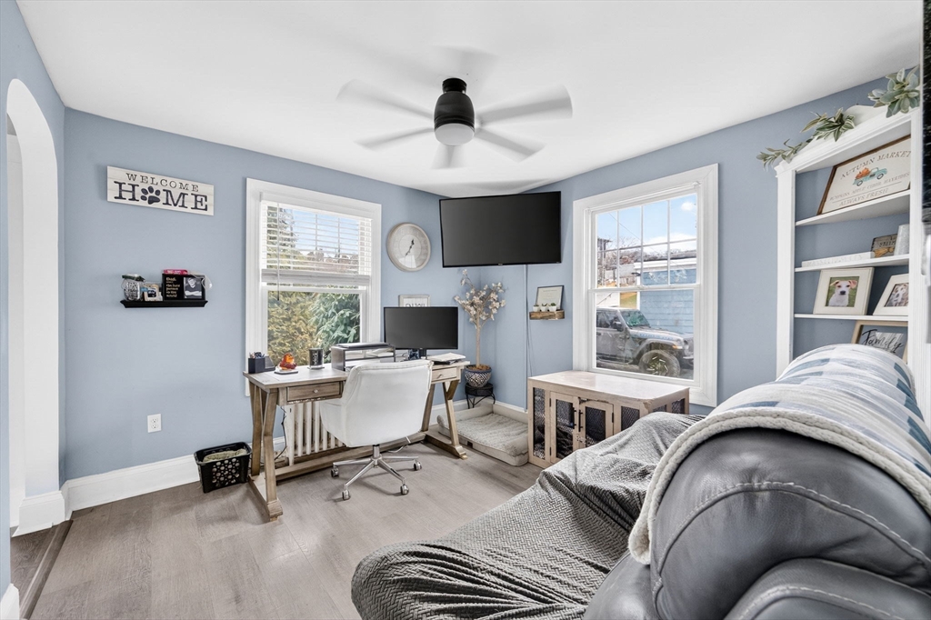 59 Glendale Street Fall River, MA 02720 - Photo 15 of 37 a living room with furniture and a fireplace