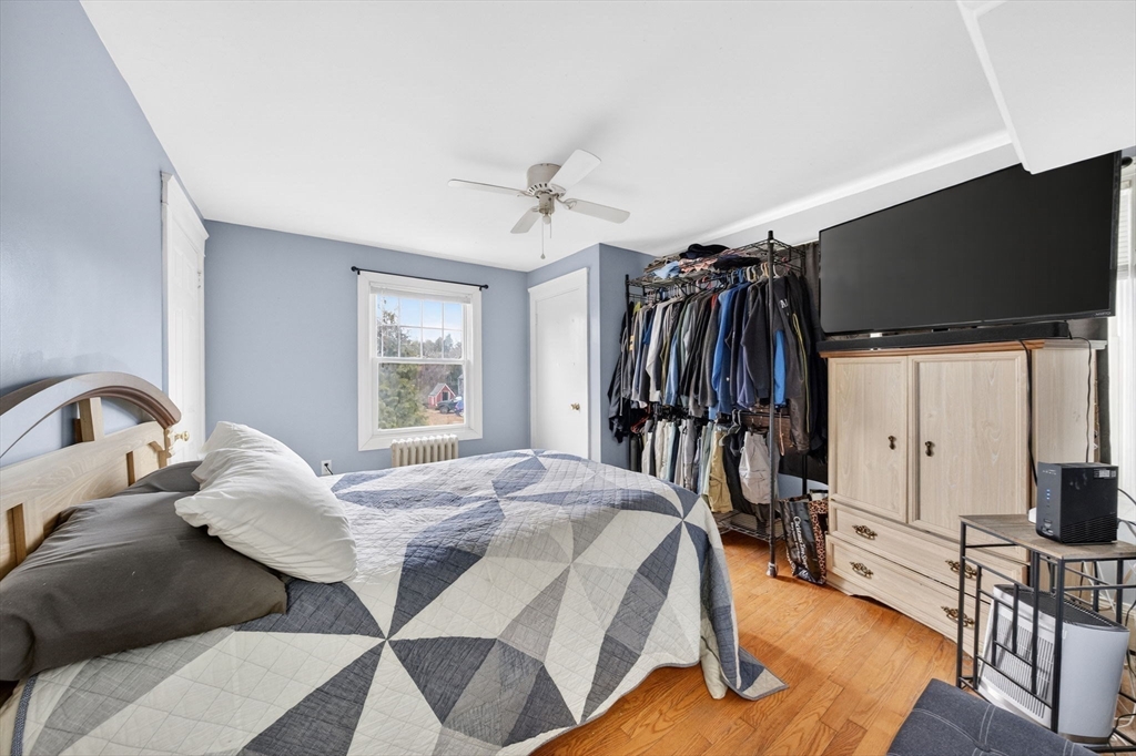 59 Glendale Street Fall River, MA 02720 - Photo 21 of 37 a bed room with a bed and a television