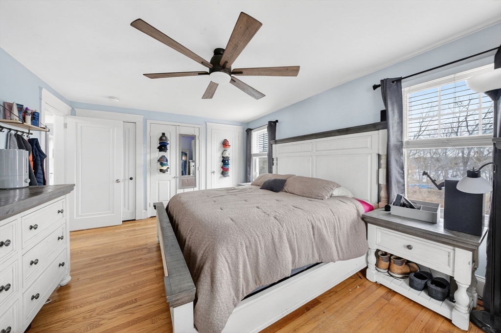 59 Glendale Street Fall River, MA 02720 - Photo 25 of 37 a bedroom with a bed and a flat tv screen on the dresser