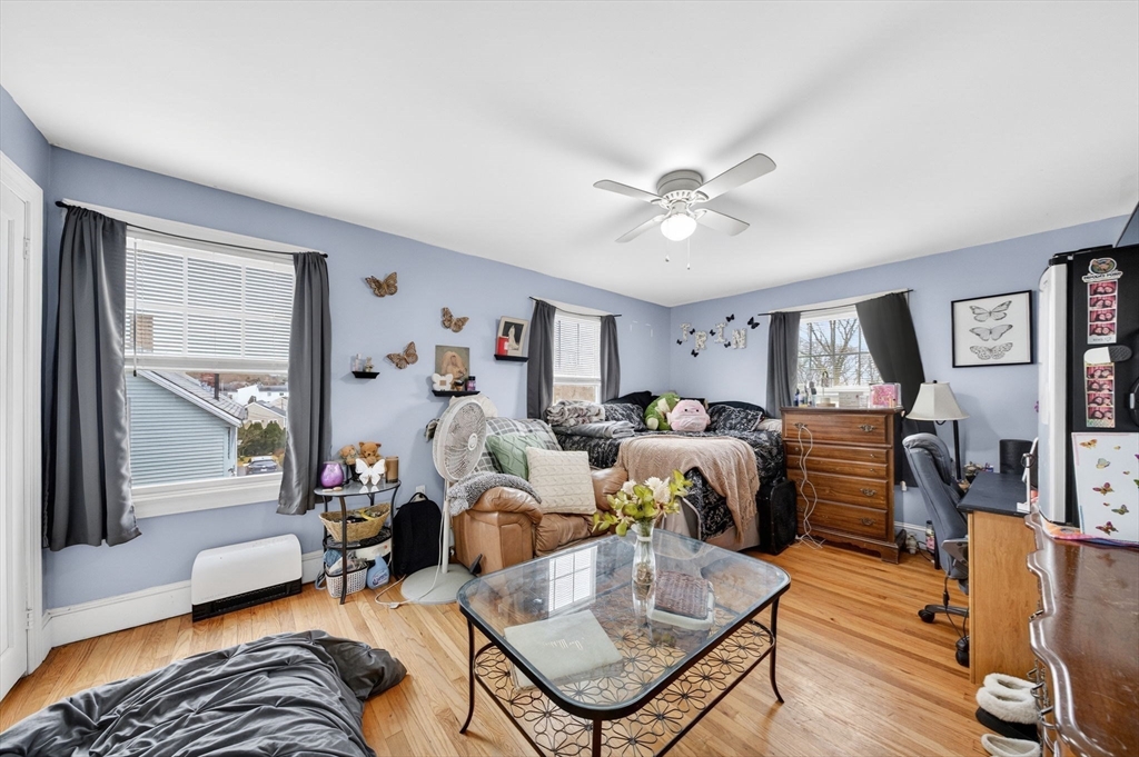 59 Glendale Street Fall River, MA 02720 - Photo 26 of 37 a living room with furniture or couch and a chandelier
