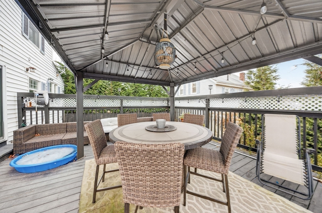 59 Glendale Street Fall River, MA 02720 - Photo 30 of 37 a view of a table and chairs in patio