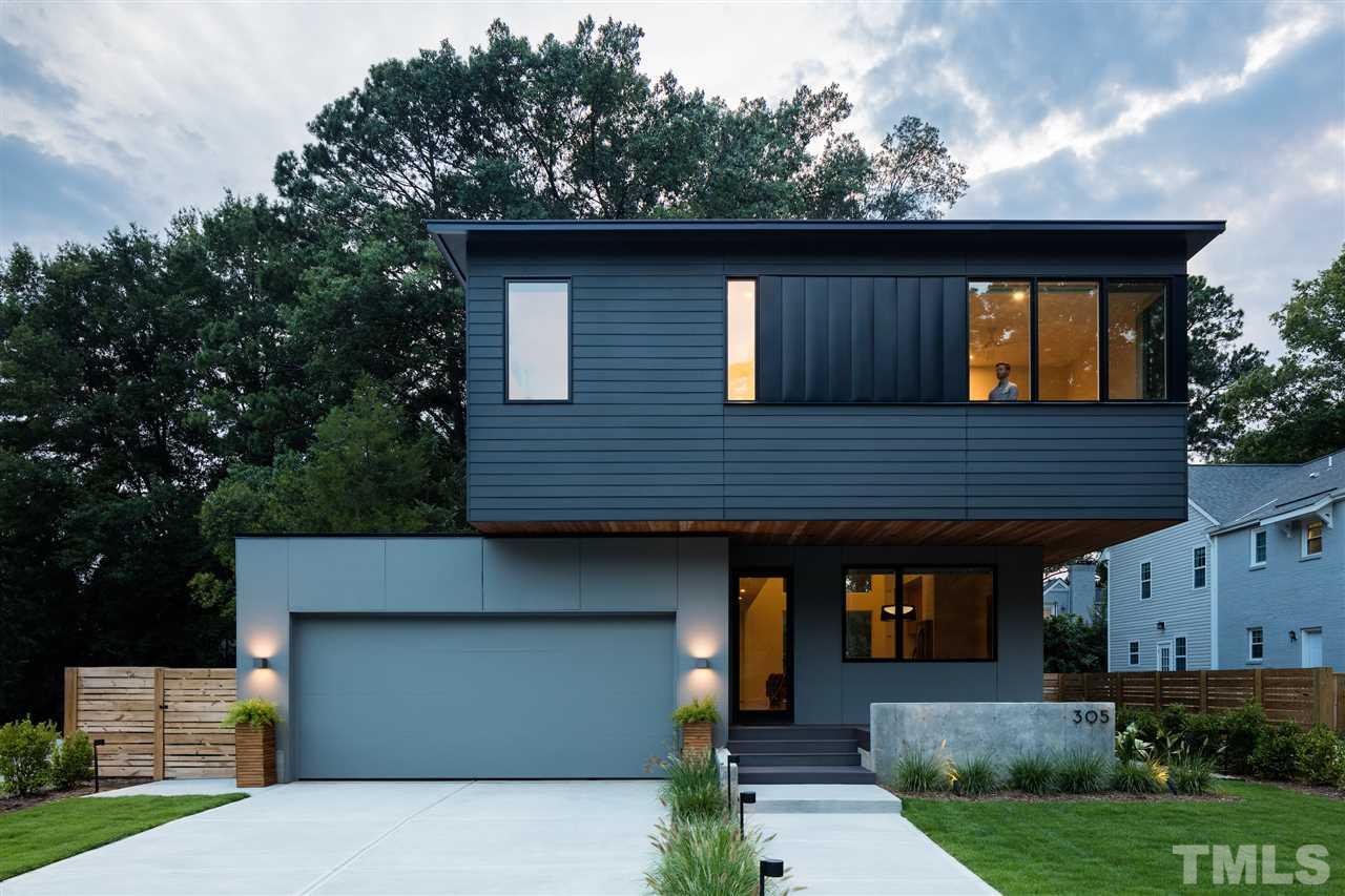 305 Horne Street Raleigh, NC 27607 - Photo 1 of 18 a front view of a house with garden