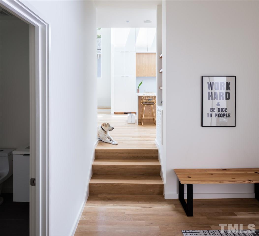 305 Horne Street Raleigh, NC 27607 - Photo 12 of 18 a view of entryway and hall with wooden floor