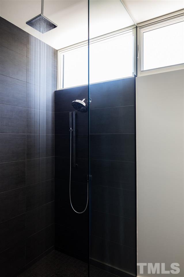 305 Horne Street Raleigh, NC 27607 - Photo 10 of 18 a bathroom with a shower