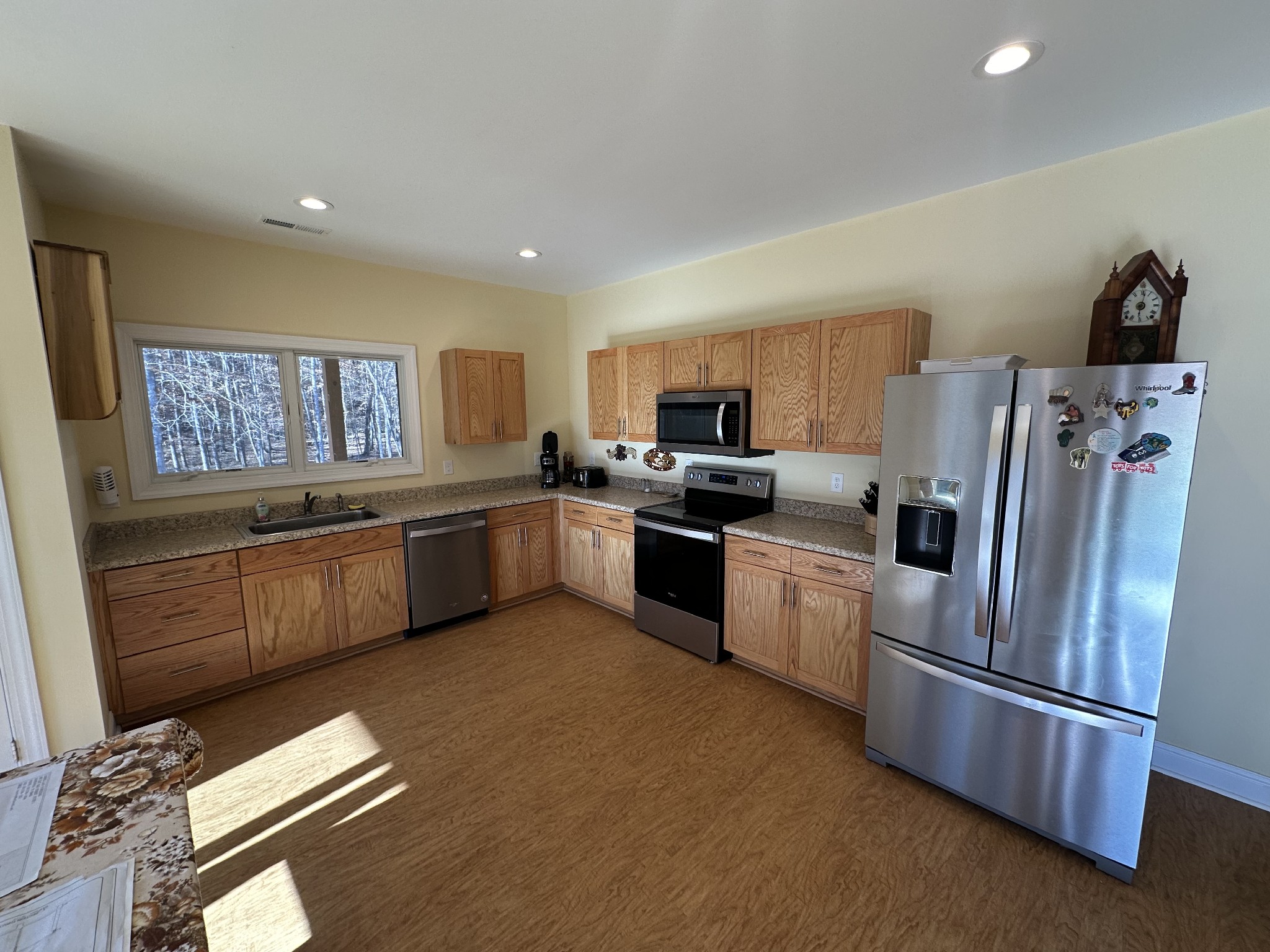 8427 Last Butler Creek Road Iron City, TN 38463 - Photo 11 of 50 a kitchen with granite countertop stainless steel appliances a sink a counter top space cabinets and stainless steel appliances