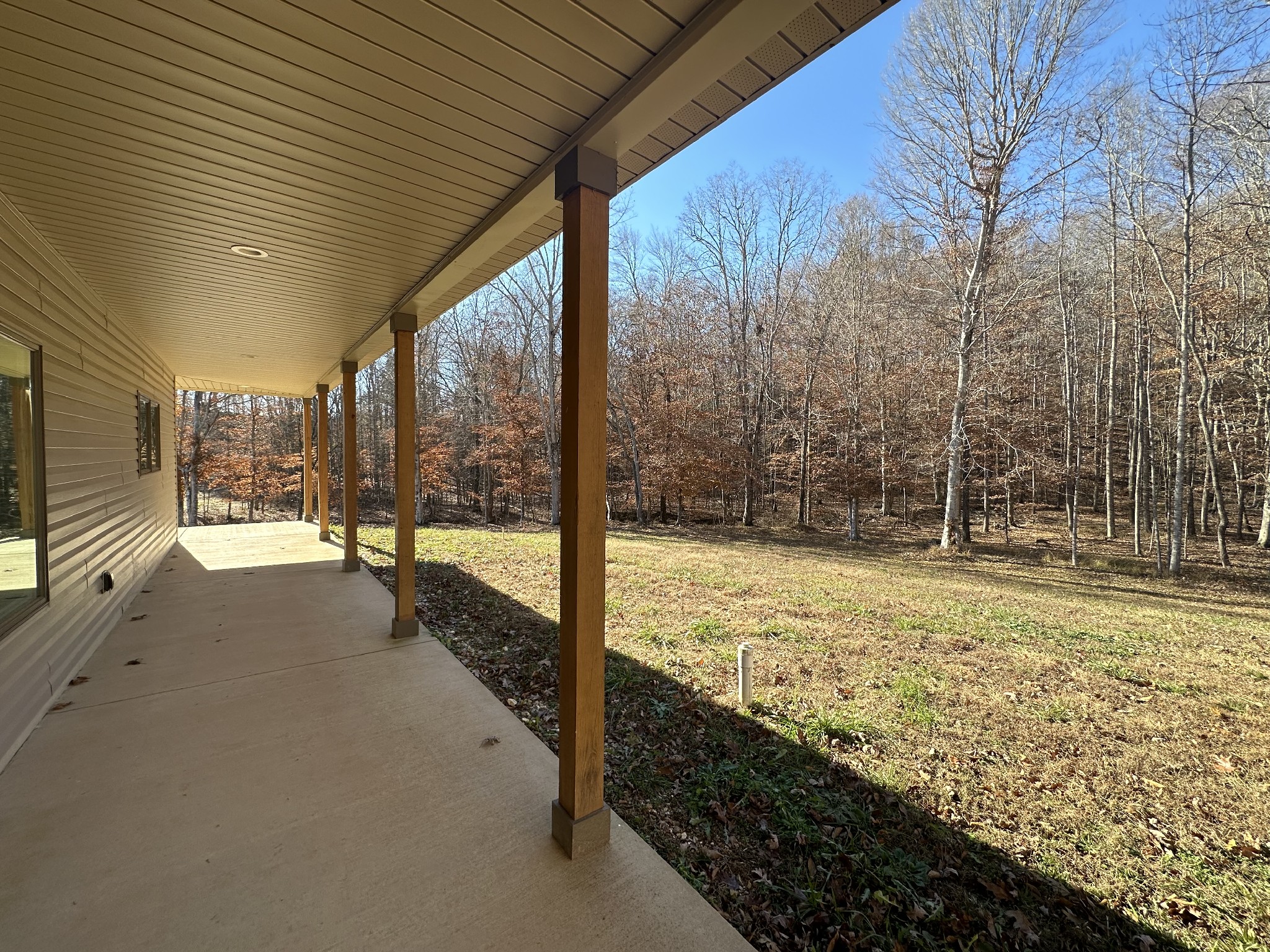 8427 Last Butler Creek Road Iron City, TN 38463 - Photo 20 of 50 a view of an empty room with wooden fence and a porch