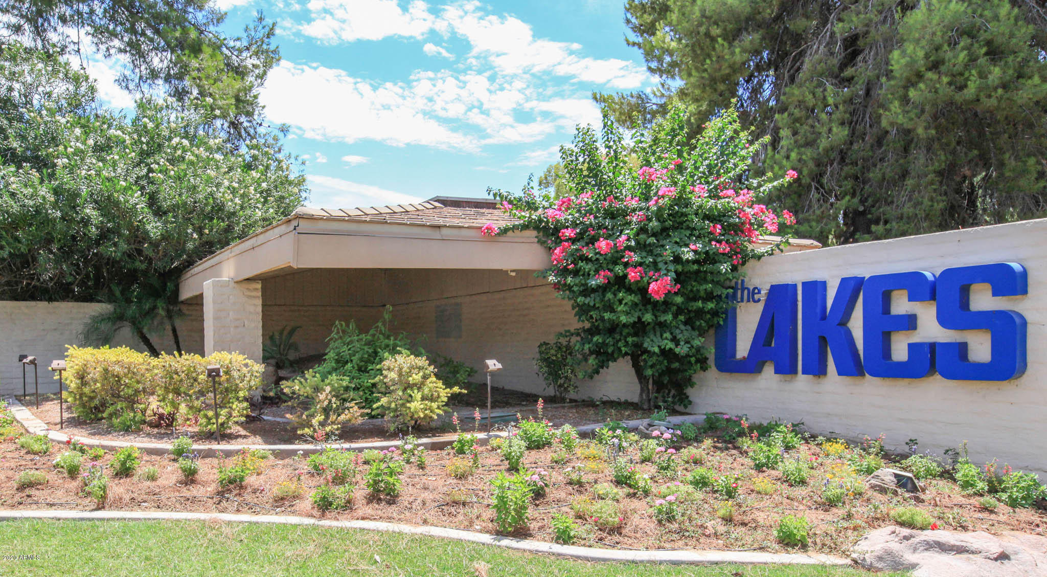 5631 South Jolly Roger Road Tempe, AZ 85283 - Photo 40 of 49 The Lakes Sign