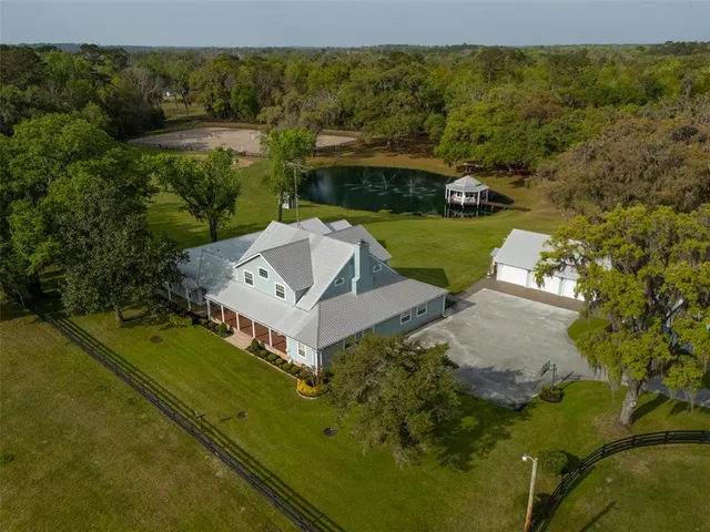 an aerial view of a house with a garden