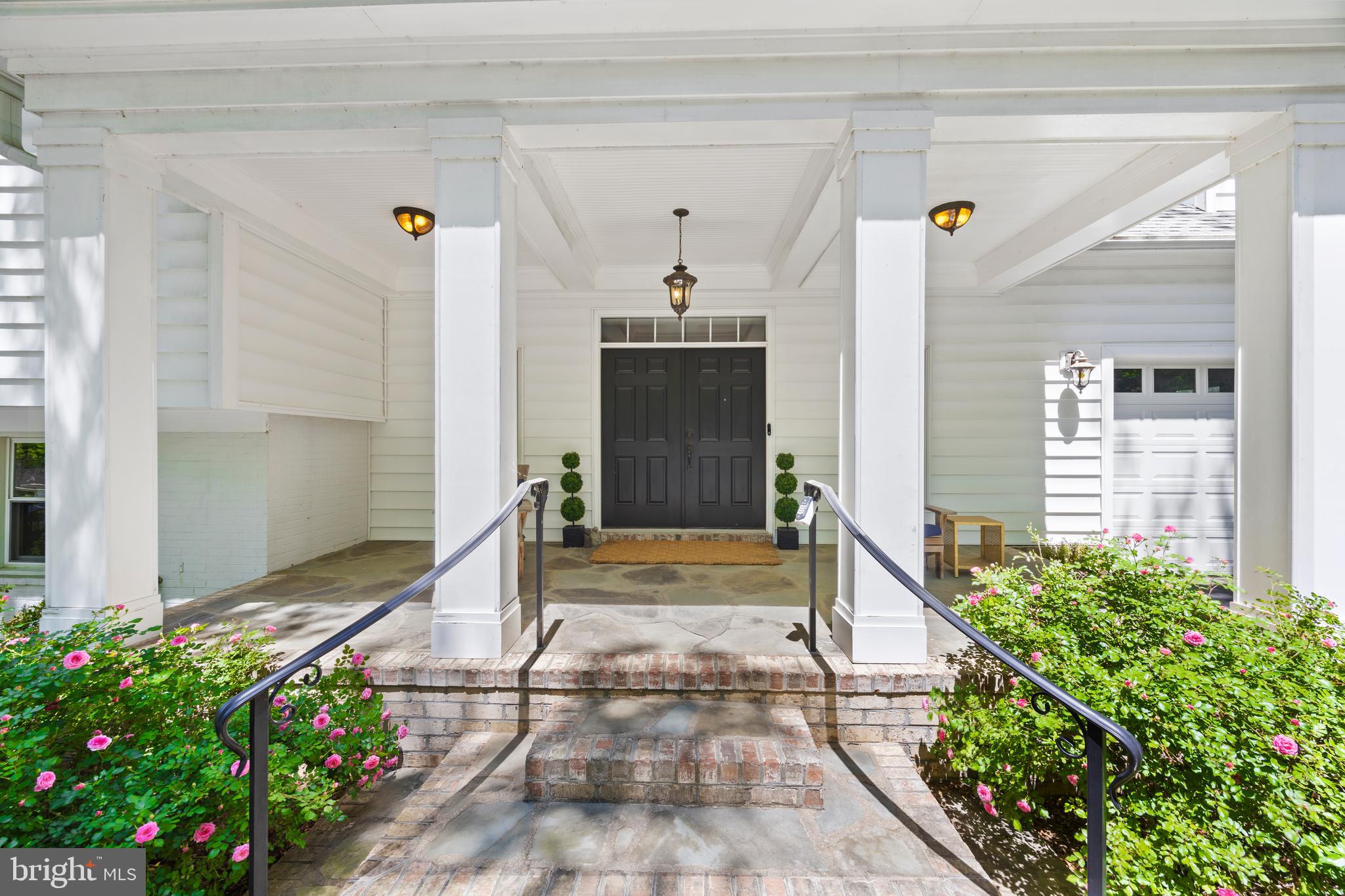 11019 Ring Road Reston, VA 20190 - Photo 3 of 78 a front view of a house with a porch