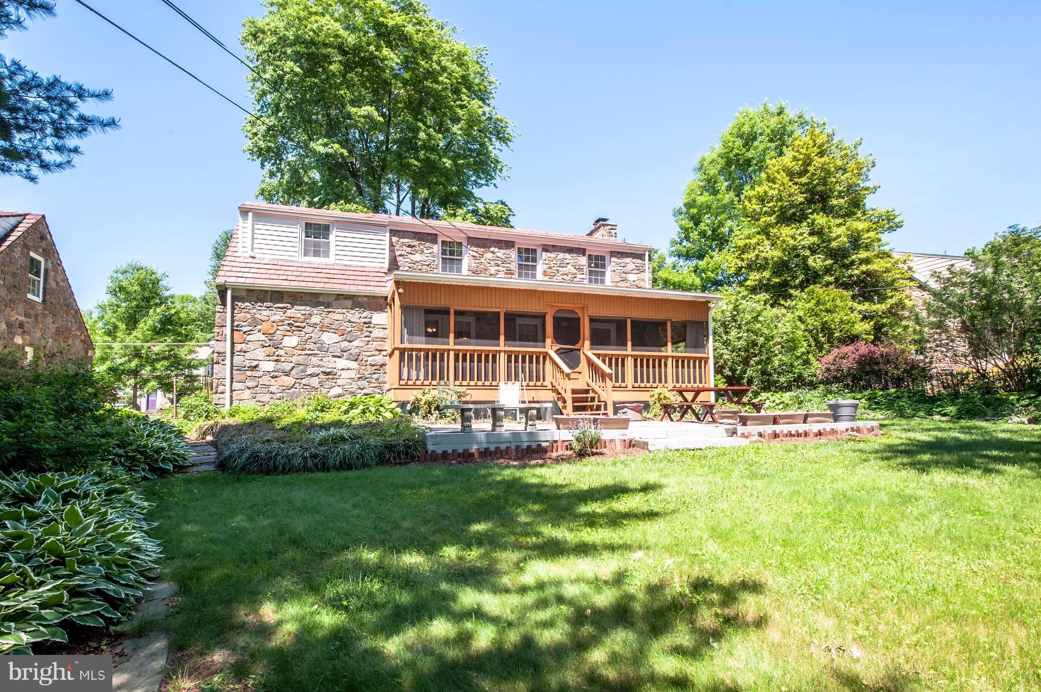 6507 Sharon Road Baltimore, MD 21239 - Photo 2 of 19 a view of a house with a yard porch and sitting area