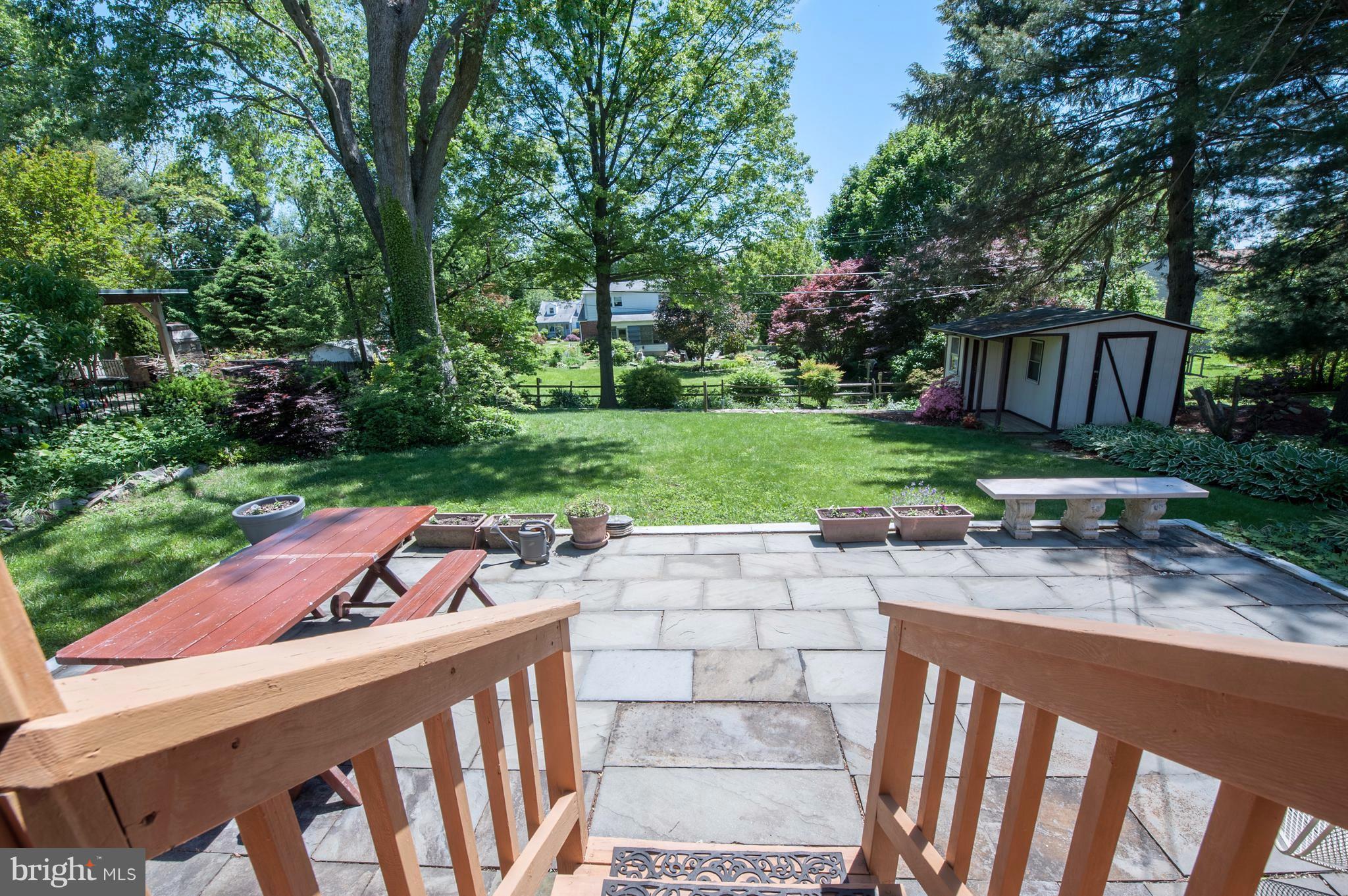 6507 Sharon Road Baltimore, MD 21239 - Photo 4 of 19 a view of a patio with chairs and plants