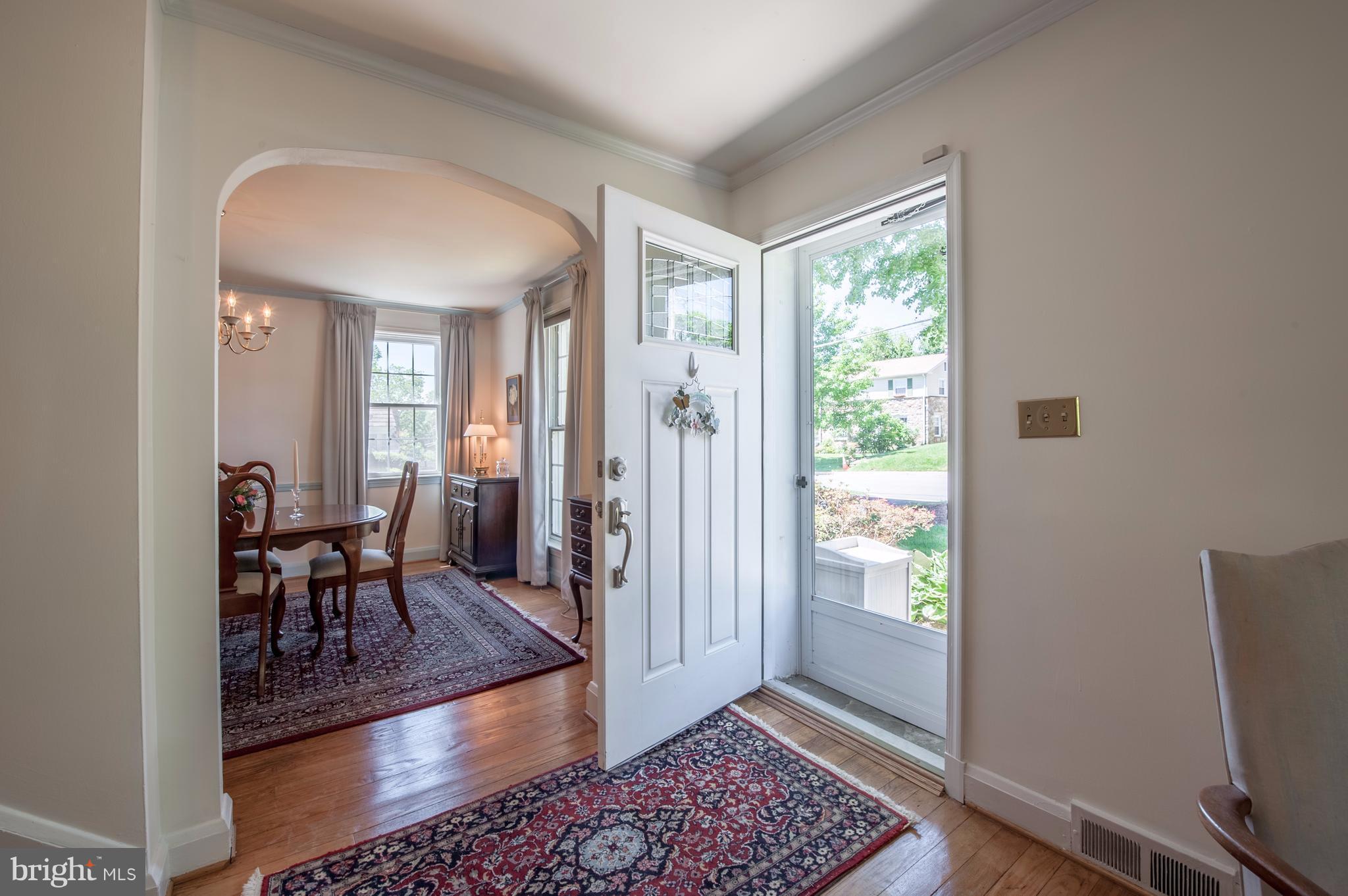 6507 Sharon Road Baltimore, MD 21239 - Photo 6 of 19 a living room with furniture and a window