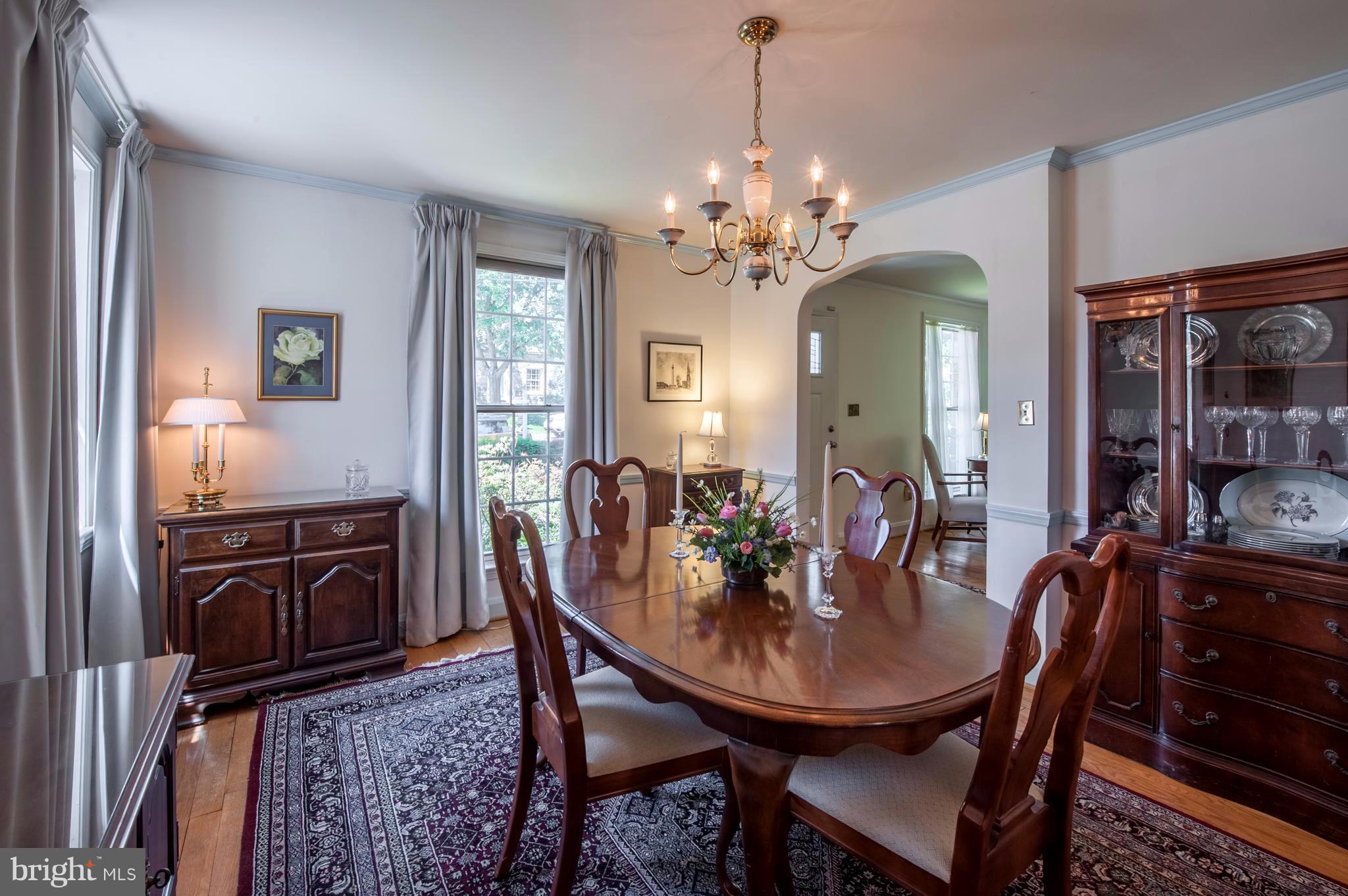 6507 Sharon Road Baltimore, MD 21239 - Photo 8 of 19 a view of a dining room with furniture