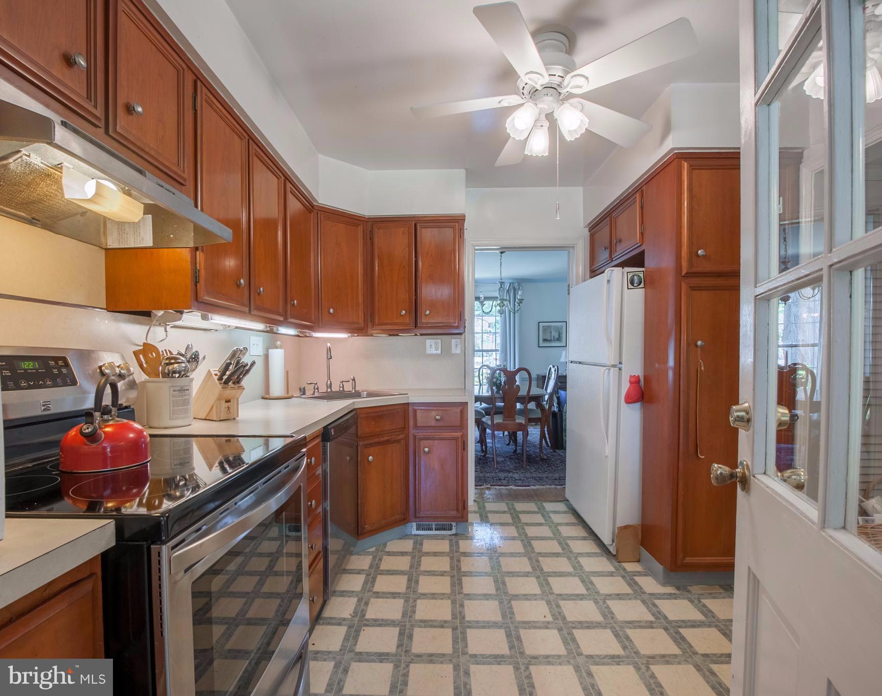 6507 Sharon Road Baltimore, MD 21239 - Photo 9 of 19 a kitchen with stainless steel appliances granite countertop a sink stove and cabinets