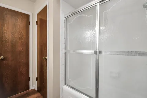 a view of a house with a yard and garage