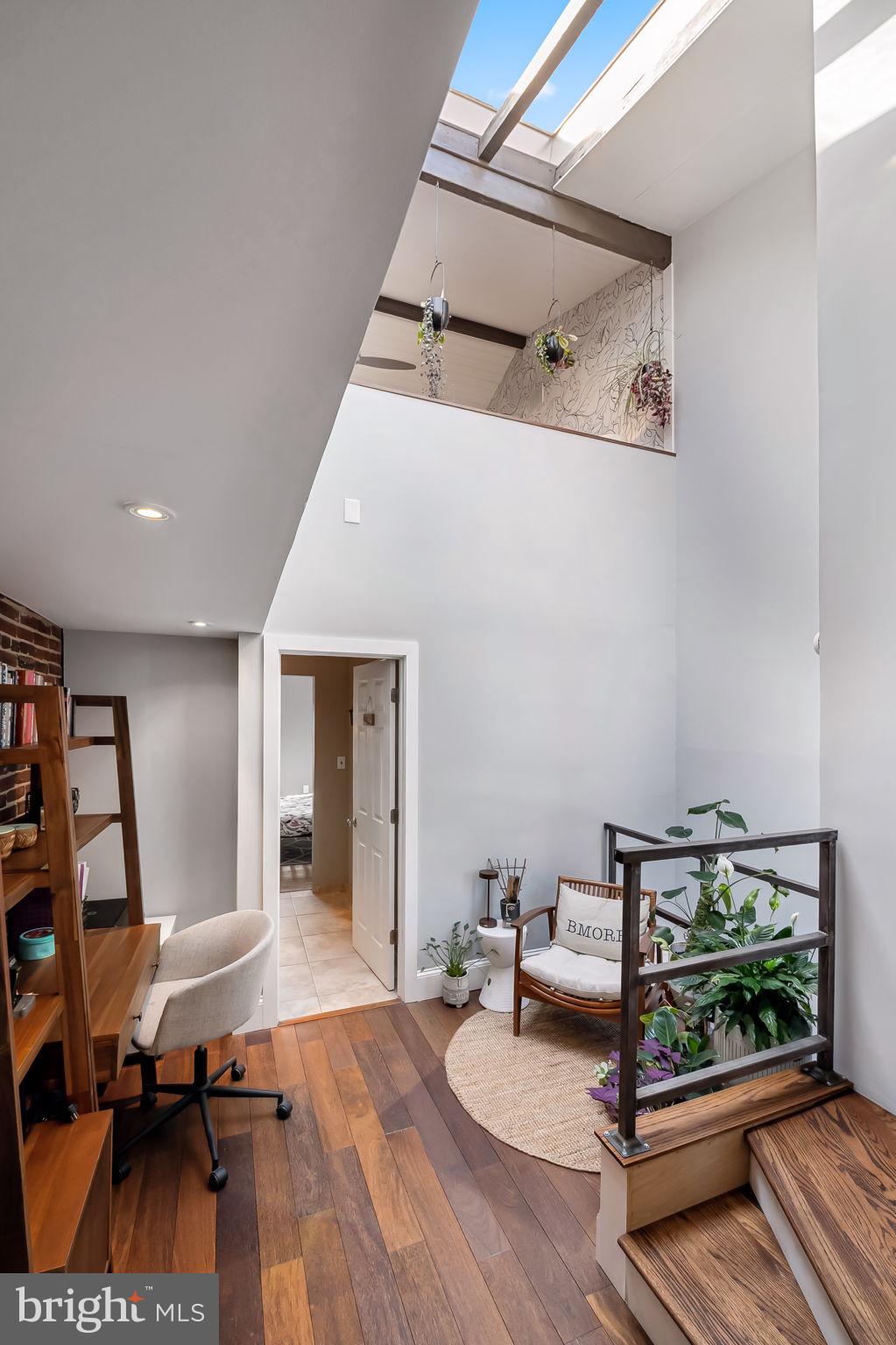 609 South Sharp Street Baltimore, MD 21230 - Photo 22 of 51 a living room with furniture and a flat screen tv