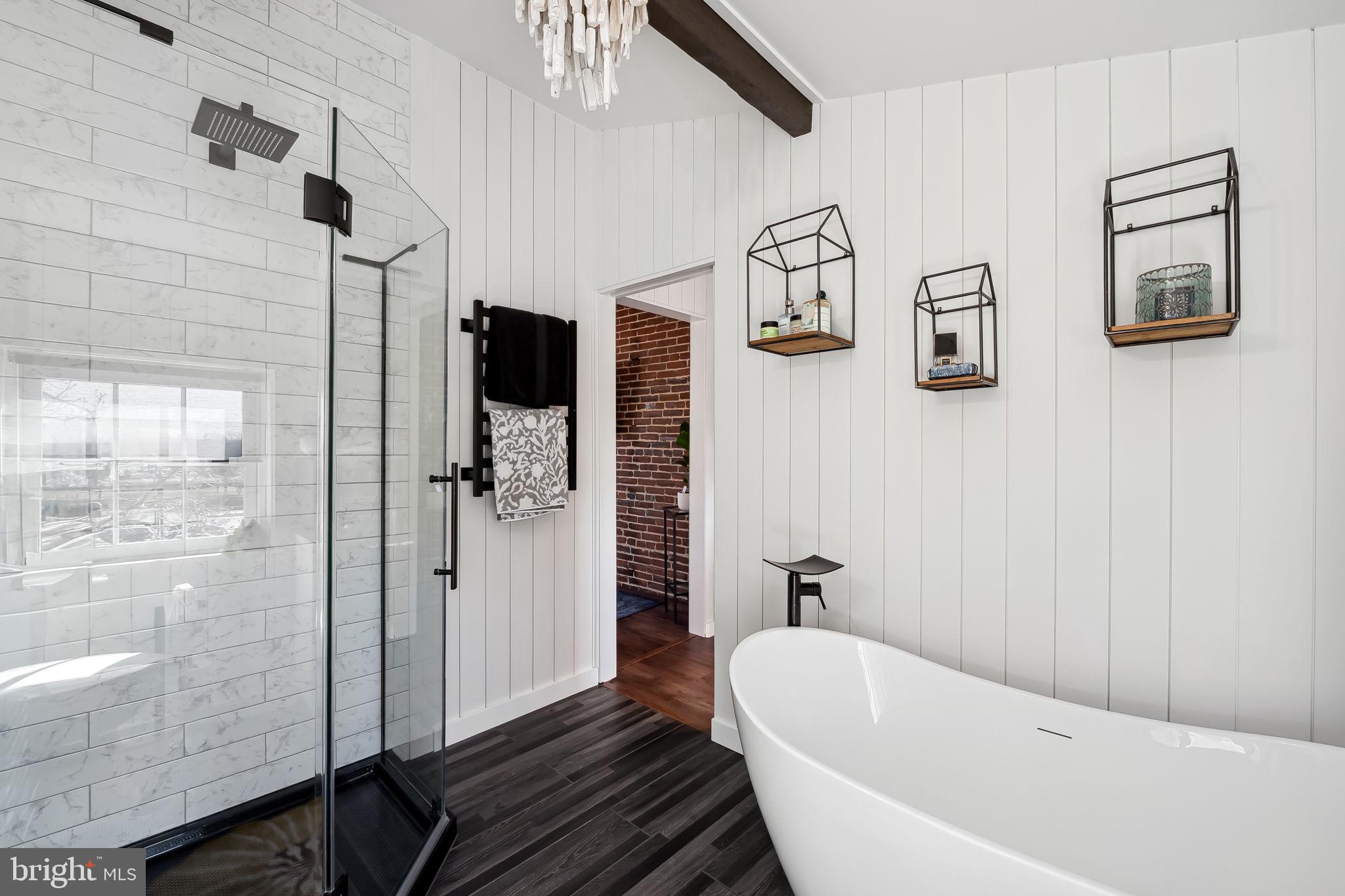 609 South Sharp Street Baltimore, MD 21230 - Photo 40 of 51 a bathroom with a bathtub and shower