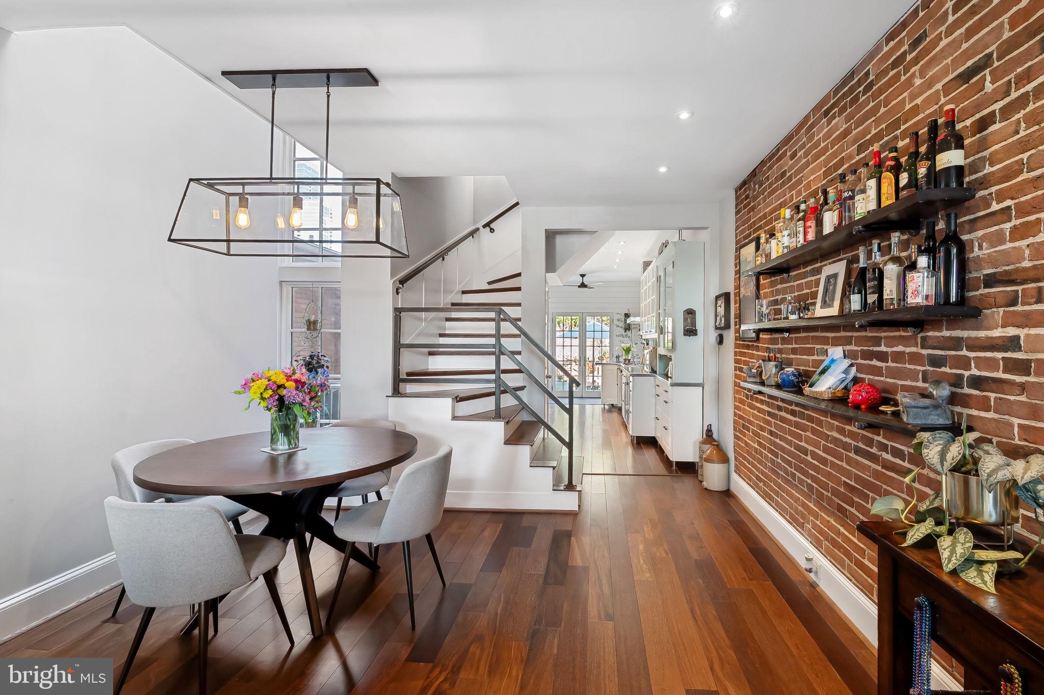 609 South Sharp Street Baltimore, MD 21230 - Photo 8 of 51 a view of a dining room with furniture and wooden floor