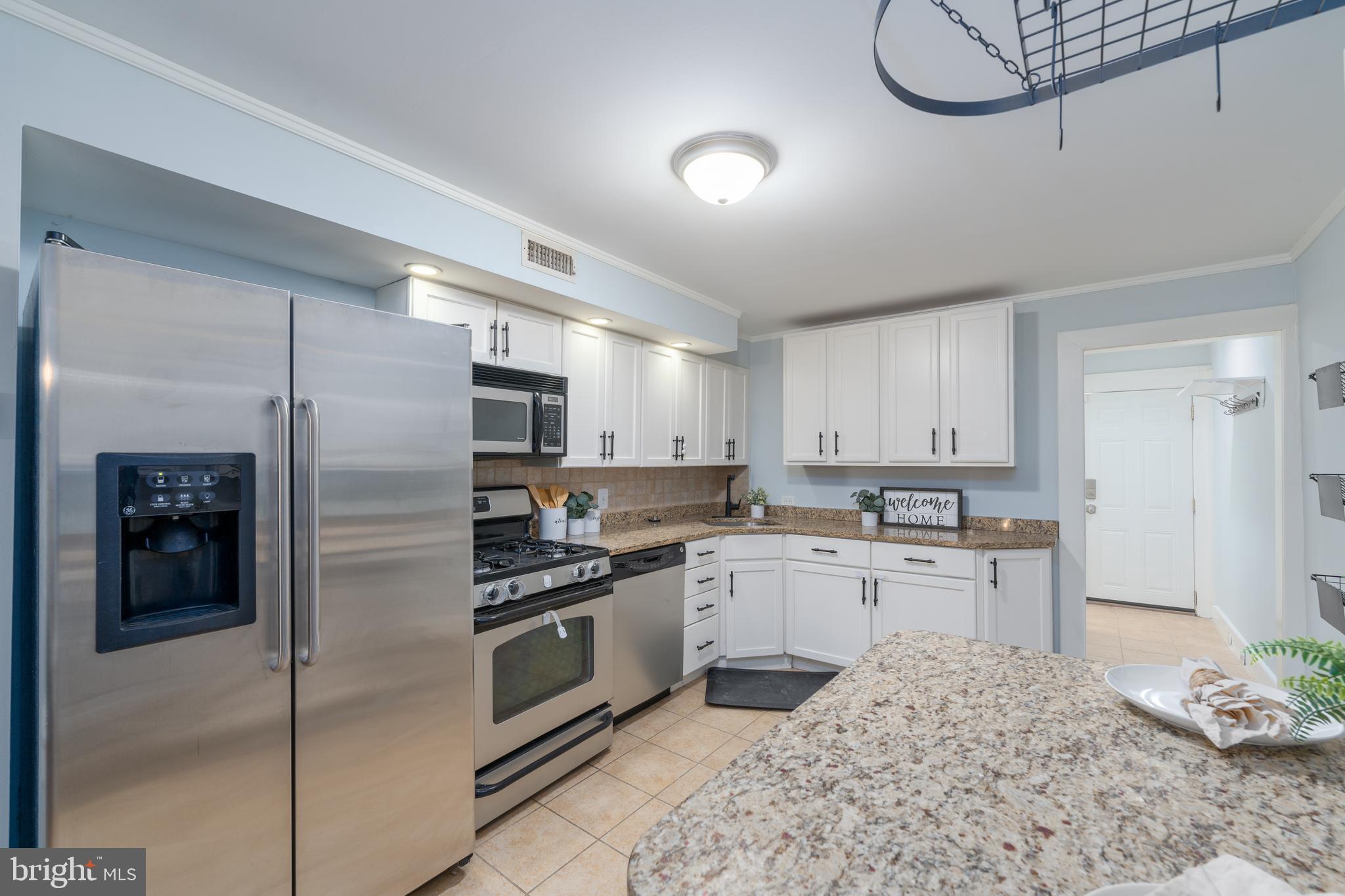 1528 Riverside Avenue Baltimore, MD 21230 - Photo 9 of 30 Kitchen with Granite Counters, Stainless Steel