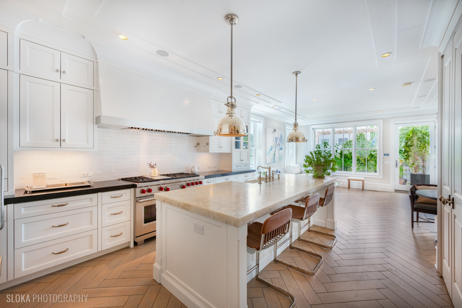 1942 North Sedgwick Street, Unit PH Chicago, IL 60614 - Photo 11 of 84 a kitchen with sink stove and cabinets