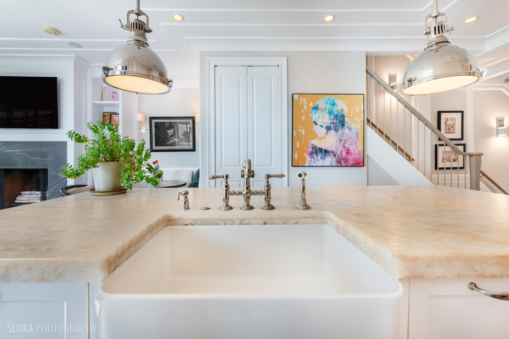 1942 North Sedgwick Street, Unit PH Chicago, IL 60614 - Photo 14 of 84 a bathroom with a sink a large mirror and a potted plant