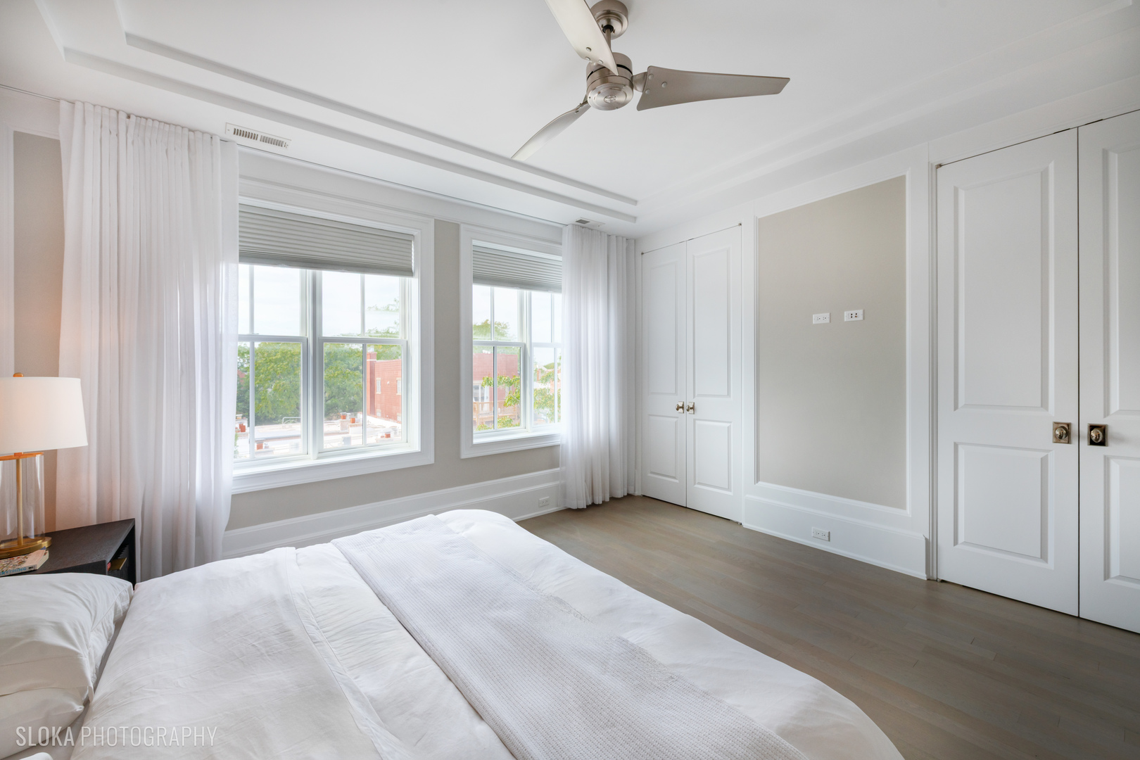 1942 North Sedgwick Street, Unit PH Chicago, IL 60614 - Photo 28 of 84 a view of a bedroom with a large bed and a window
