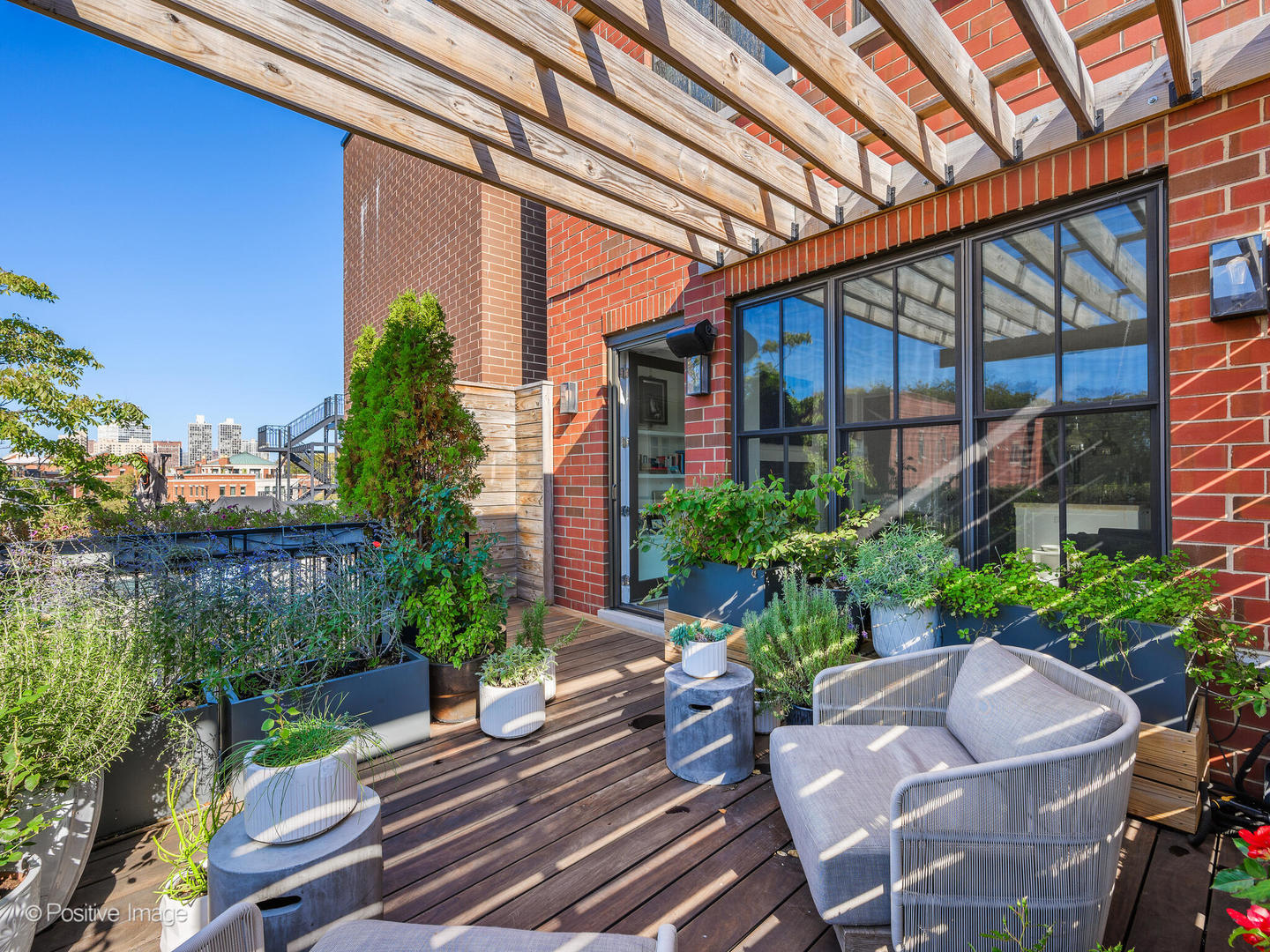 1942 North Sedgwick Street, Unit PH Chicago, IL 60614 - Photo 37 of 84 a view of yard with patio