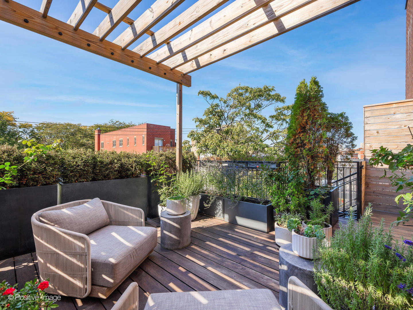 1942 North Sedgwick Street, Unit PH Chicago, IL 60614 - Photo 38 of 84 a view of a patio with couches and potted plants