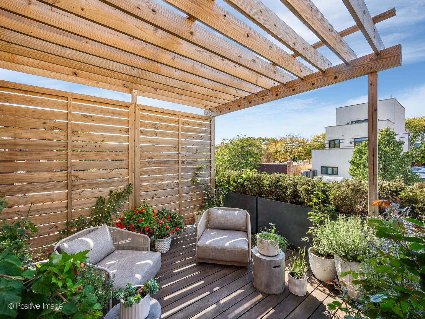 1942 North Sedgwick Street, Unit PH Chicago, IL 60614 - Photo 39 of 84 a view of a patio with couches chairs potted plants and city view