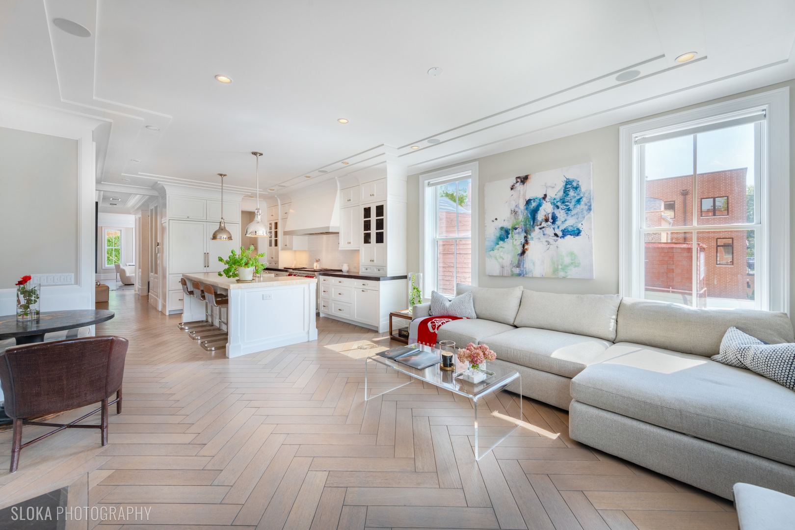 1942 North Sedgwick Street, Unit PH Chicago, IL 60614 - Photo 4 of 84 a living room with furniture and kitchen view