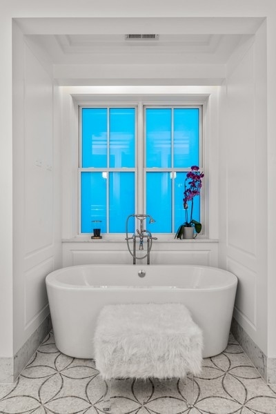 1942 North Sedgwick Street, Unit PH Chicago, IL 60614 - Photo 51 of 84 a white bath tub sitting in a bathroom