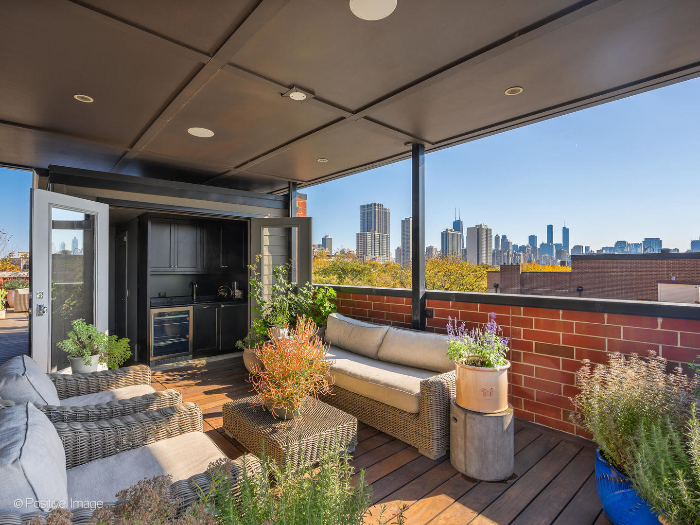 1942 North Sedgwick Street, Unit PH Chicago, IL 60614 - Photo 65 of 84 a outdoor living space with patio furniture and potted plants