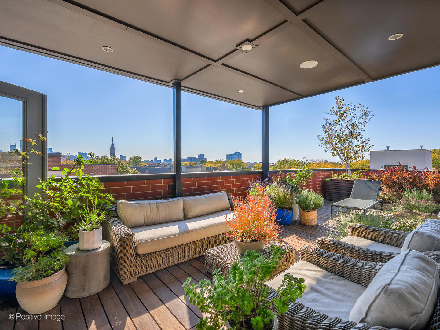 1942 North Sedgwick Street, Unit PH Chicago, IL 60614 - Photo 68 of 84 a outdoor living space with furniture and a potted plant