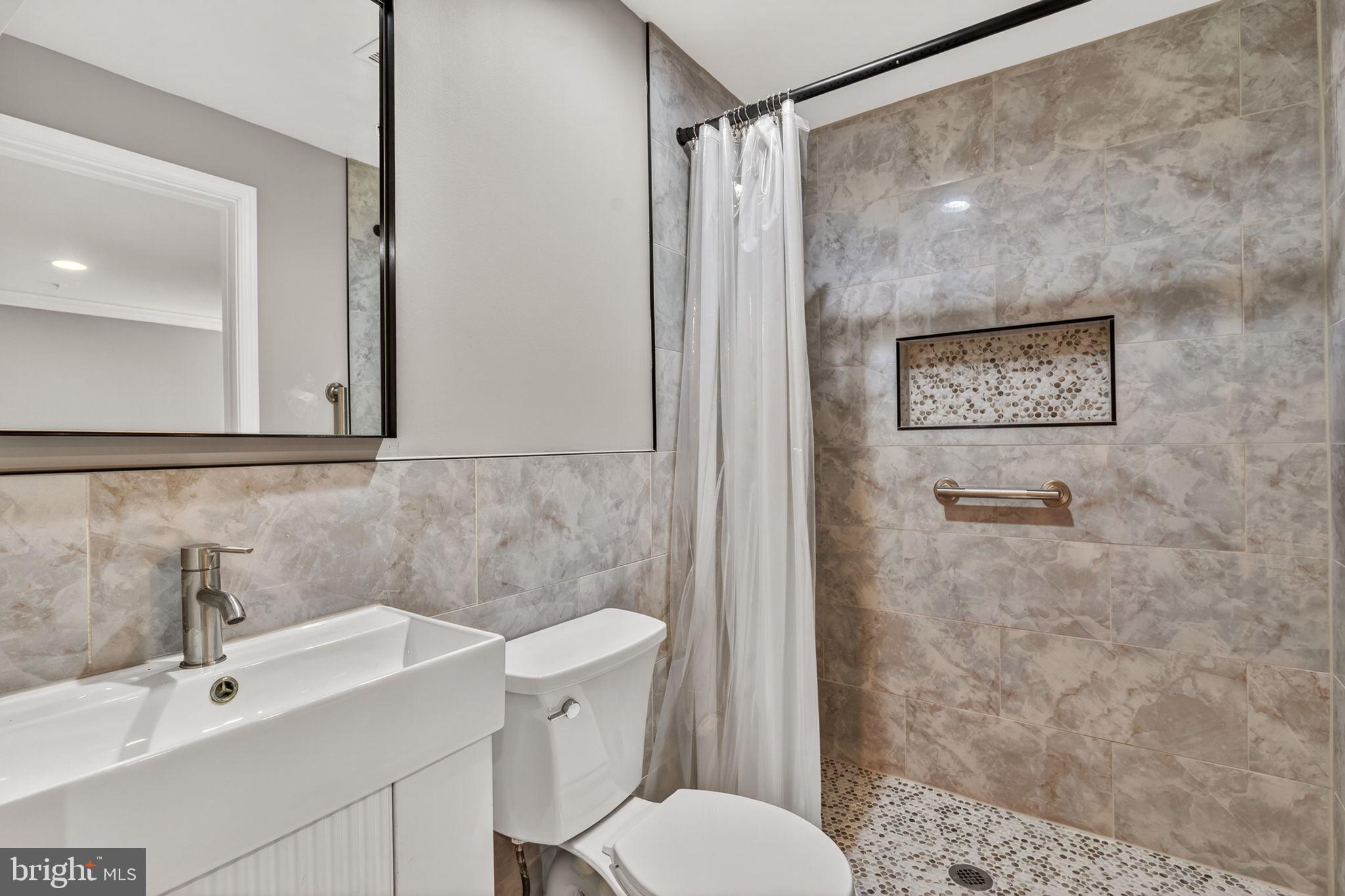 1200 Strausberg Street Accokeek, MD 20607 - Photo 45 of 47 Renovated full bath in basement
