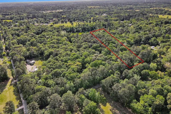 $90,000 | 15672 Ben Wiggins Road, Conroe, TX 77303
