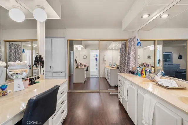 a bathroom with a toilet and a shower curtain