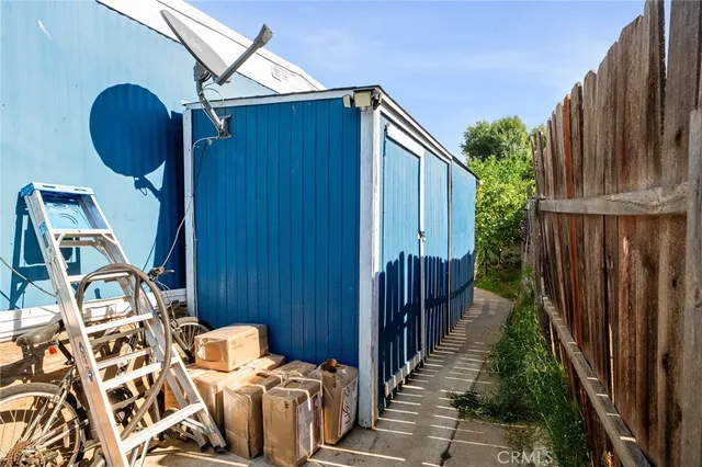 a view of street with tall buildings
