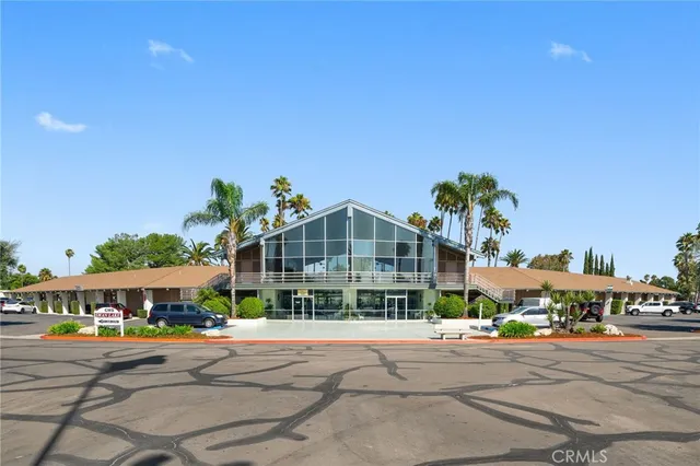 a room with pool table and window