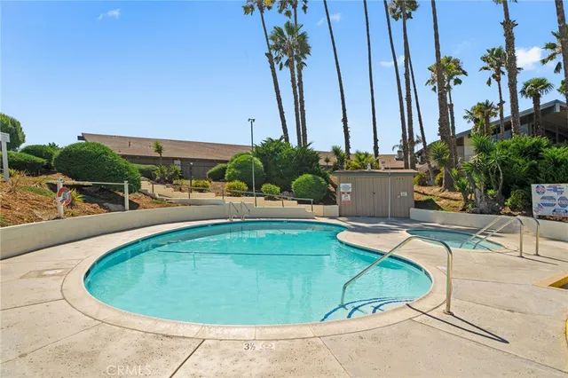a view of a lake with a building in the background