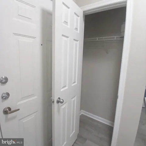a bathroom with a glass door