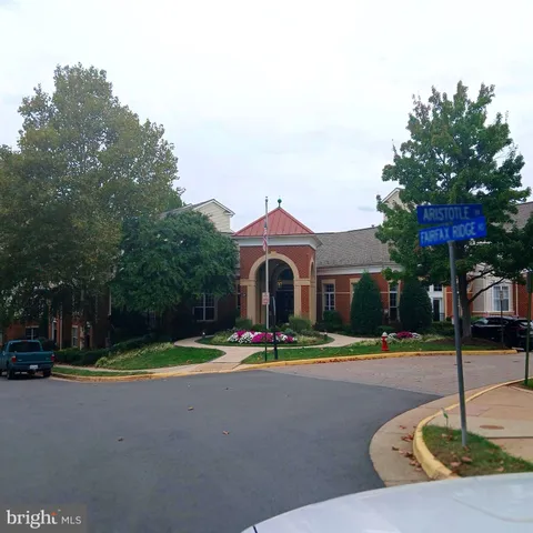 a view of street with houses and trees