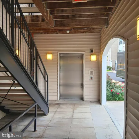 a view of a brick building with many windows