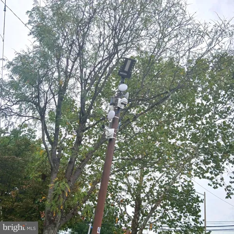 a lobby with furniture and a mirror
