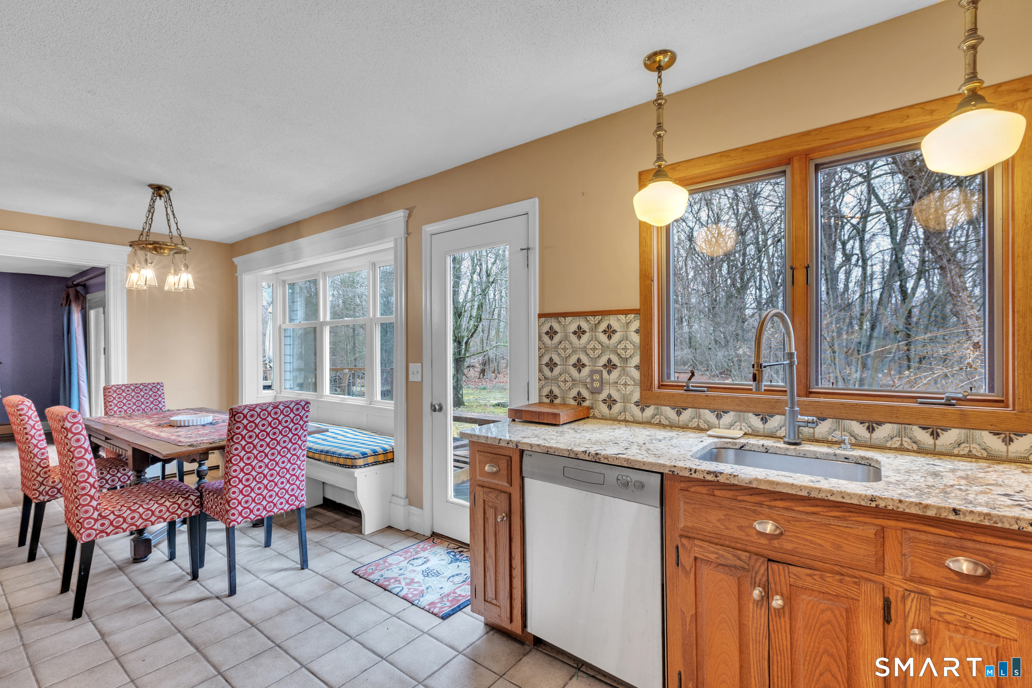 176 Stephen Drive Meriden, CT 06450 - Photo 11 of 34 a view of a dining room with furniture window and outside view