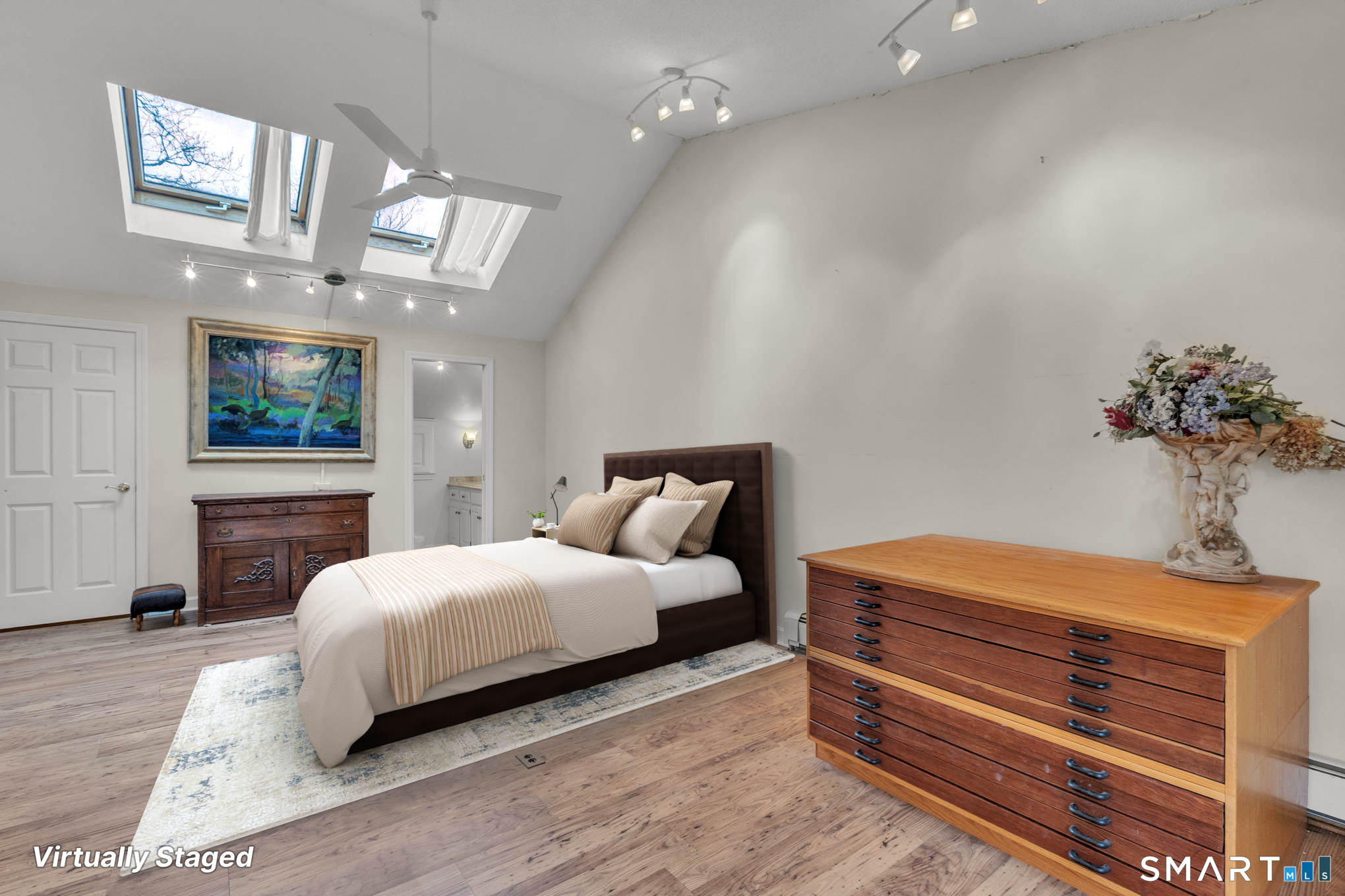 176 Stephen Drive Meriden, CT 06450 - Photo 17 of 34 a bedroom with a bed lamps and fireplace