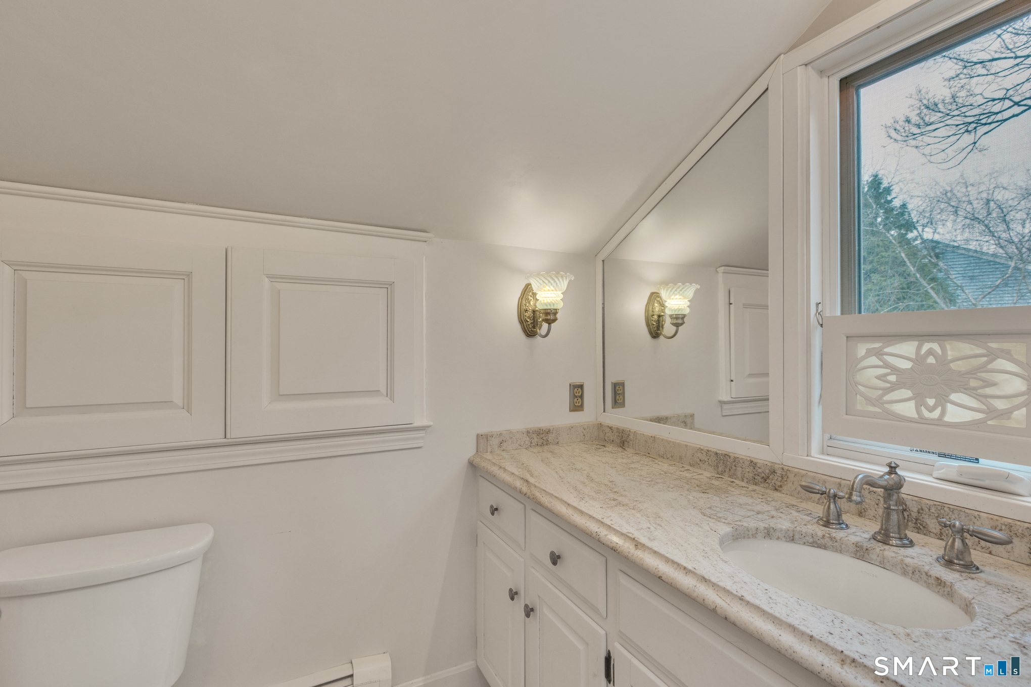 176 Stephen Drive Meriden, CT 06450 - Photo 22 of 34 a bathroom with a granite countertop sink a toilet and a mirror