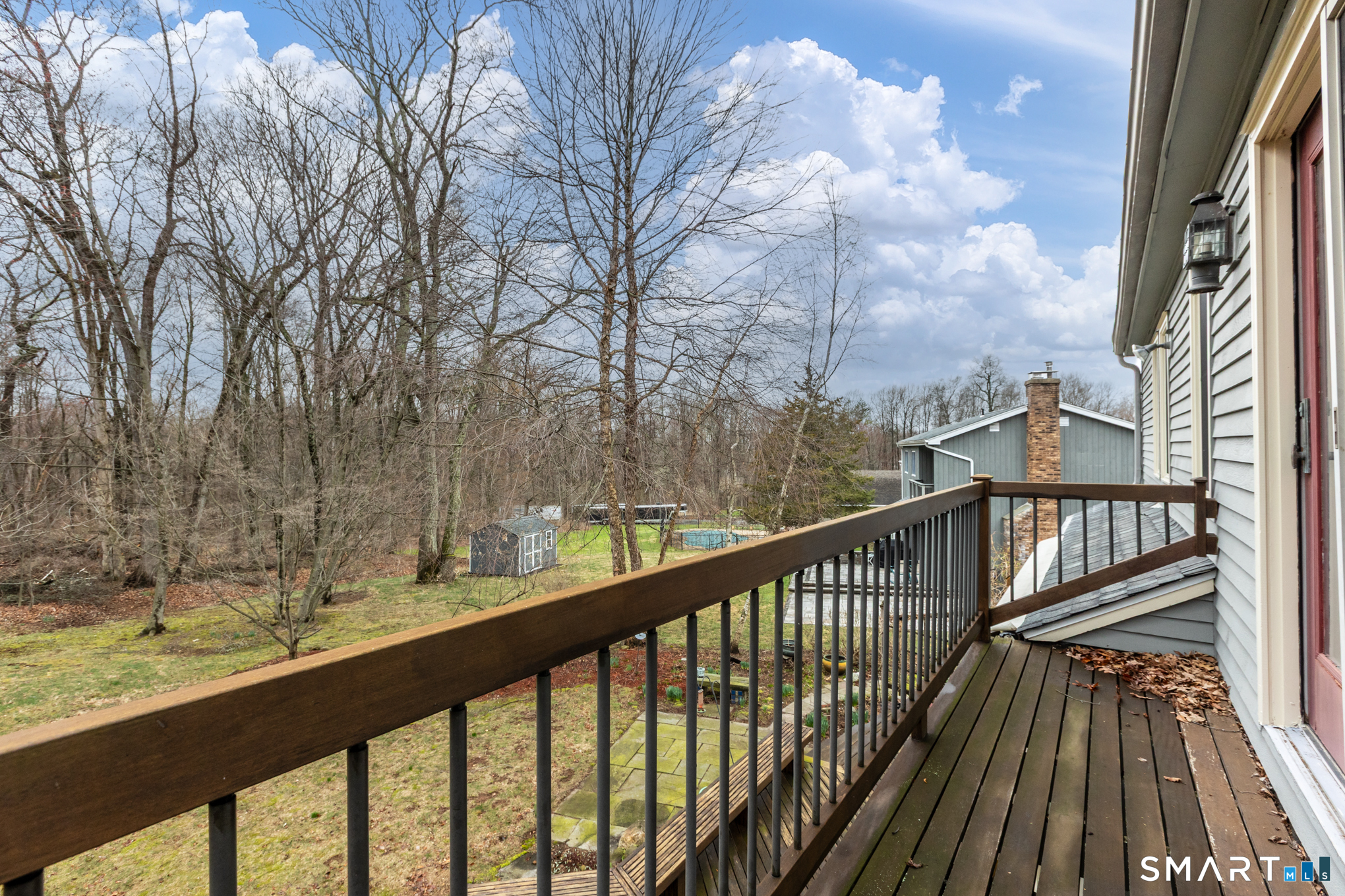 176 Stephen Drive Meriden, CT 06450 - Photo 24 of 34 a view of balcony with wooden floor and fence