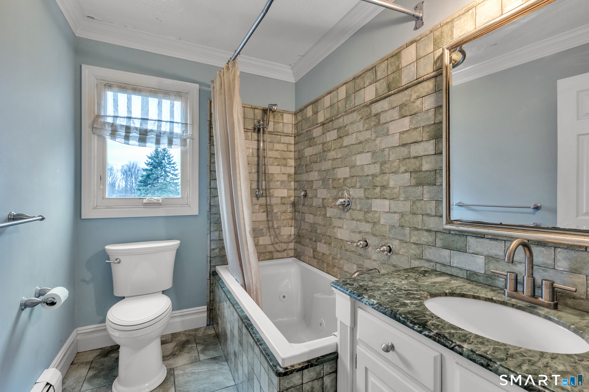 176 Stephen Drive Meriden, CT 06450 - Photo 25 of 34 a bathroom with a granite countertop toilet a sink and a bathtub